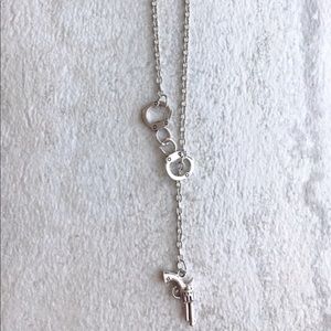 Gun and handcuffs necklace